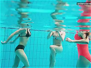 trio bare ladies have joy underwater
