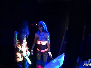 Behind the gigs on Abigail Mac's blacklight porno set